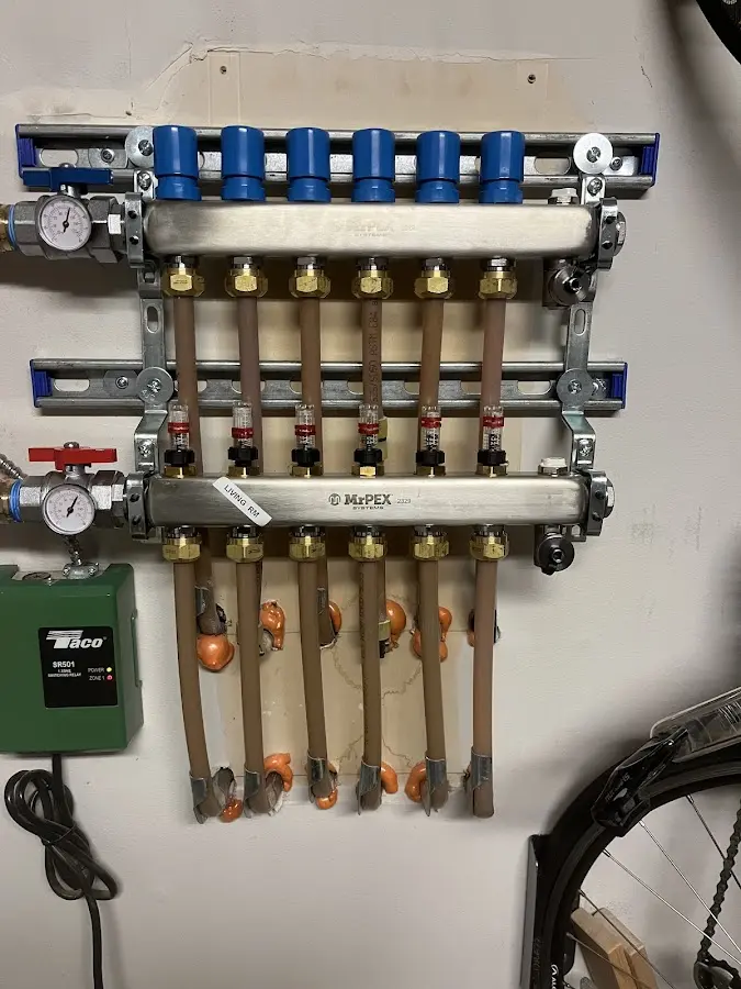 Plumber performing Water Heater Repair at a residential property in Forestville